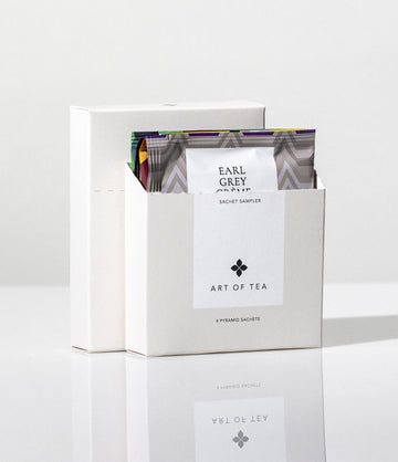 Tea bag sampler with 'Art of Tea' branding on a white background