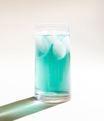 Blue Pineapple iced tea poured over ice – Art of Tea
